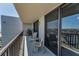Spacious balcony with comfortable seating and open city views at 1660 Gulf Blvd # Ph-7, Clearwater Beach, FL 33767