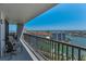 Wide balcony offers beautiful views of the surrounding waterfront and city at 1660 Gulf Blvd # Ph-7, Clearwater Beach, FL 33767