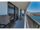 Extended balcony with chairs overlooking amazing ocean and city views at 1660 Gulf Blvd # Ph-7, Clearwater Beach, FL 33767