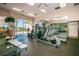 Gym featuring treadmills, stationary bikes, and weightlifting equipment, plus a mirrored wall at 1660 Gulf Blvd # Ph-7, Clearwater Beach, FL 33767