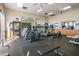 Well-equipped gym offering various exercise machines and fitness equipment, with large mirrors and ample lighting at 1660 Gulf Blvd # Ph-7, Clearwater Beach, FL 33767