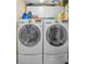 Laundry room featuring a stacked washer and dryer with storage at 1660 Gulf Blvd # Ph-7, Clearwater Beach, FL 33767
