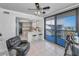 Open living area with modern furnishings and kitchen access at 1660 Gulf Blvd # Ph-7, Clearwater Beach, FL 33767