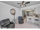 Comfortable living space adjacent to the kitchen and bar seating at 1660 Gulf Blvd # Ph-7, Clearwater Beach, FL 33767