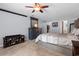 Inviting bedroom boasts plush carpet, a king-sized bed, ample closet space, and soft lighting at 1686 Spottswood Cir, Palm Harbor, FL 34683