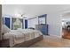 Calming main bedroom with natural light, plush carpet, and a serene ambiance at 1686 Spottswood Cir, Palm Harbor, FL 34683