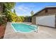 A refreshing pool and screened lanai create the perfect space for outdoor living and entertaining at 1686 Spottswood Cir, Palm Harbor, FL 34683