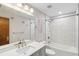 Bright bathroom with tub and shower, vanity, and mirror at 170 Foxfire Ln, Oldsmar, FL 34677