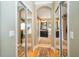 Hallway to a luxurious bathroom featuring multiple vanities at 18002 Forest Retreat Ln, Tampa, FL 33647