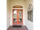 Inviting front entrance with double doors and decorative details at 18002 Forest Retreat Ln, Tampa, FL 33647