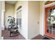 Charming front porch with seating area, perfect for relaxing at 18002 Forest Retreat Ln, Tampa, FL 33647