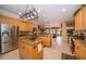 Well-appointed kitchen with granite countertops, stainless steel appliances, and an island at 18002 Forest Retreat Ln, Tampa, FL 33647