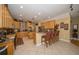 Spacious kitchen featuring custom cabinetry, granite countertops, and modern stainless steel appliances at 18002 Forest Retreat Ln, Tampa, FL 33647