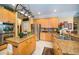 Modern kitchen featuring stainless steel appliances, granite counters, and an island at 18002 Forest Retreat Ln, Tampa, FL 33647