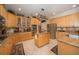Open kitchen with a center island, stainless steel appliances, and ample cabinet space at 18002 Forest Retreat Ln, Tampa, FL 33647