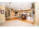 Comfortable living room with hardwood floors, a decorative media center, and natural lighting at 18002 Forest Retreat Ln, Tampa, FL 33647