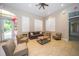 Community lounge with comfortable seating and an abundance of natural light at 18002 Forest Retreat Ln, Tampa, FL 33647