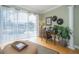 Bright sitting area with views of the pool and access to the outdoors at 18002 Forest Retreat Ln, Tampa, FL 33647