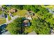 Spacious home surrounded by lush greenery in a quiet neighborhood, highlighted in this beautiful aerial view at 23253 Granite Pl, Land O Lakes, FL 34639