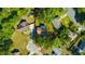 Aerial view of a house within property lines highlighting the surrounding landscaping and neighborhood at 23253 Granite Pl, Land O Lakes, FL 34639