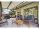 Spacious screened porch with plenty of room for outdoor furniture and entertaining at 23253 Granite Pl, Land O Lakes, FL 34639