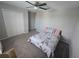 Bedroom featuring carpet, closet, and a ceiling fan at 238 Argyll Dr, Spring Hill, FL 34609
