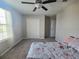Bedroom featuring carpet, closet, and a ceiling fan at 238 Argyll Dr, Spring Hill, FL 34609