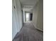 Neutral hallway with white trim, leading to various rooms in the house at 238 Argyll Dr, Spring Hill, FL 34609