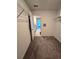 Spacious walk-in closet with carpet and wire shelving for optimal storage at 238 Argyll Dr, Spring Hill, FL 34609