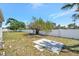 Expansive backyard featuring a privacy fence and potential space for outdoor activities at 264 S Port Royal Ln, Apollo Beach, FL 33572