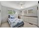 Bright bedroom with ample natural light, a ceiling fan and closet space at 264 S Port Royal Ln, Apollo Beach, FL 33572