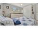 Cozy bedroom featuring built-in dresser, overhead lighting and closet space at 264 S Port Royal Ln, Apollo Beach, FL 33572