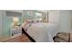A serene bedroom with floral bedding and soft lighting for a relaxing atmosphere at 264 S Port Royal Ln, Apollo Beach, FL 33572