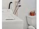 This is a laundry closet area with a washer and toilet in close proximity at 264 S Port Royal Ln, Apollo Beach, FL 33572