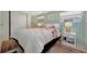 Inviting main bedroom with floral bedding, soft lighting, and warm accents at 264 S Port Royal Ln, Apollo Beach, FL 33572