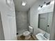 Beautifully renovated bathroom featuring tiled shower and modern fixtures at 26448 Eager Rd, Punta Gorda, FL 33955