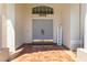 Close-up of double front doors and tiled entryway, complemented by decorative accents and columns at 28451 Great Bend Pl, Wesley Chapel, FL 33543