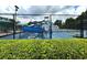 Community water park offers a bright blue slide and splash area for Gathering fun at 28451 Great Bend Pl, Wesley Chapel, FL 33543