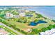 Picturesque aerial view of the golf course and waterfront condos on the coast at 2933 Bough Ave # C, Clearwater, FL 33760
