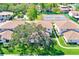 A lovely community featuring a pool, tennis court, lush greenery, and charming residences at 2933 Bough Ave # C, Clearwater, FL 33760