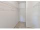 Walk-in closet with wire shelving and carpeted flooring at 2933 Bough Ave # C, Clearwater, FL 33760