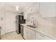 Updated kitchen featuring new countertops, modern faucet, and stainless steel appliances at 2933 Bough Ave # C, Clearwater, FL 33760