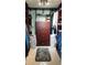 Walk-in closet with built-in shelving, drawers and hanging storage space, with a rug on the floor at 3062 Eastland Blvd # 105, Clearwater, FL 33761