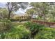 Picturesque building surrounded by lush greenery and walking bridge at 3062 Eastland Blvd # 105, Clearwater, FL 33761