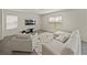Bright living room features modern furniture, neutral paint, and natural light at 30739 Penny Surf Loop, Wesley Chapel, FL 33545