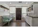 Bright entryway with bench and hutch storage at 3113 W Sligh Ave, Tampa, FL 33614