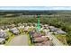 Lovely aerial view of a tile roof home with a pool and private pond at 31382 Chesapeake Bay Dr, Wesley Chapel, FL 33543