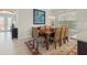 Elegant dining room featuring a spacious table and seating for six, creating a perfect setting for gatherings at 31382 Chesapeake Bay Dr, Wesley Chapel, FL 33543