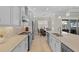 Bright kitchen featuring stainless steel appliances, light countertops, and dining area with natural light at 31382 Chesapeake Bay Dr, Wesley Chapel, FL 33543