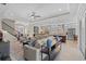 Expansive open-concept living space with combined living, dining, and kitchen areas, plus access to the outdoors at 31382 Chesapeake Bay Dr, Wesley Chapel, FL 33543
